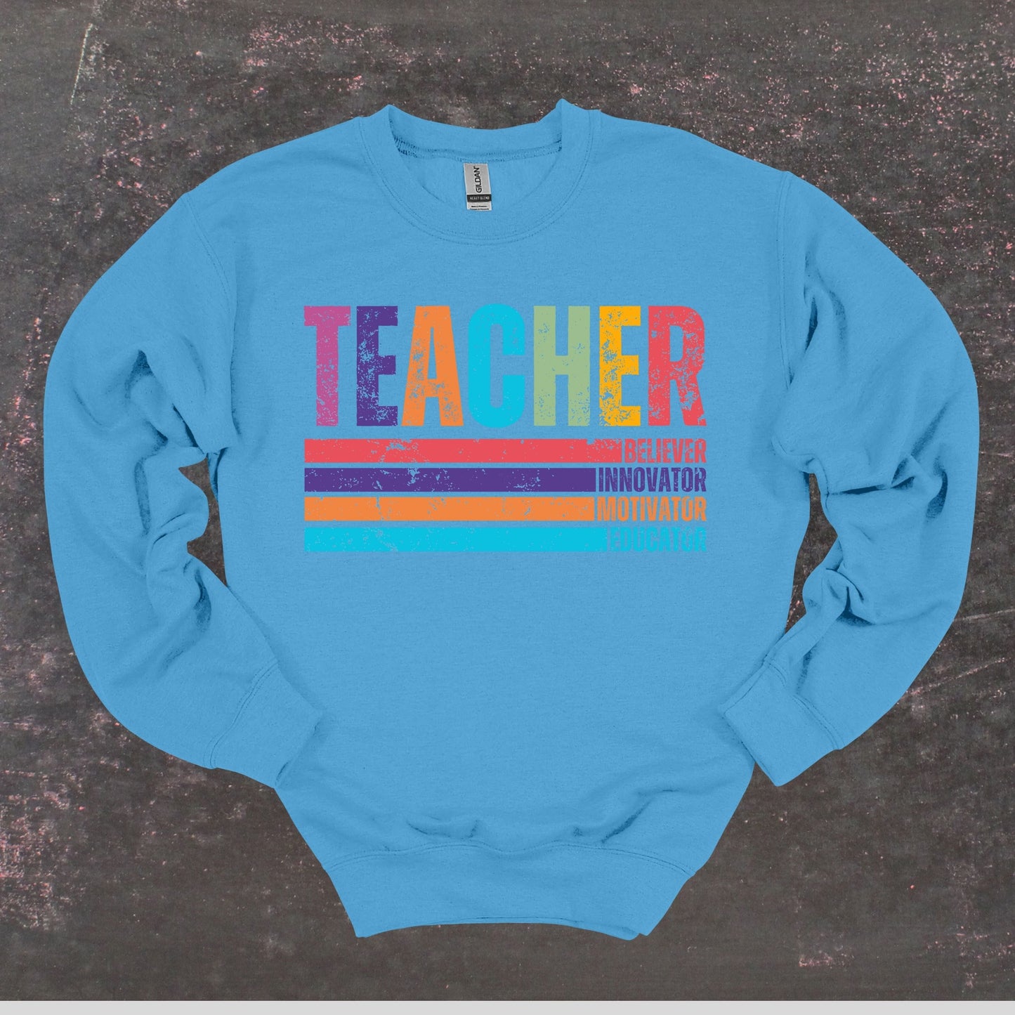 Teacher Believer Innovator Motivator Educator - Teacher Crewneck Sweatshirt - Adult Sweatshirts Crewneck Sweatshirt Graphic Avenue Carolina Blue Adult Small 