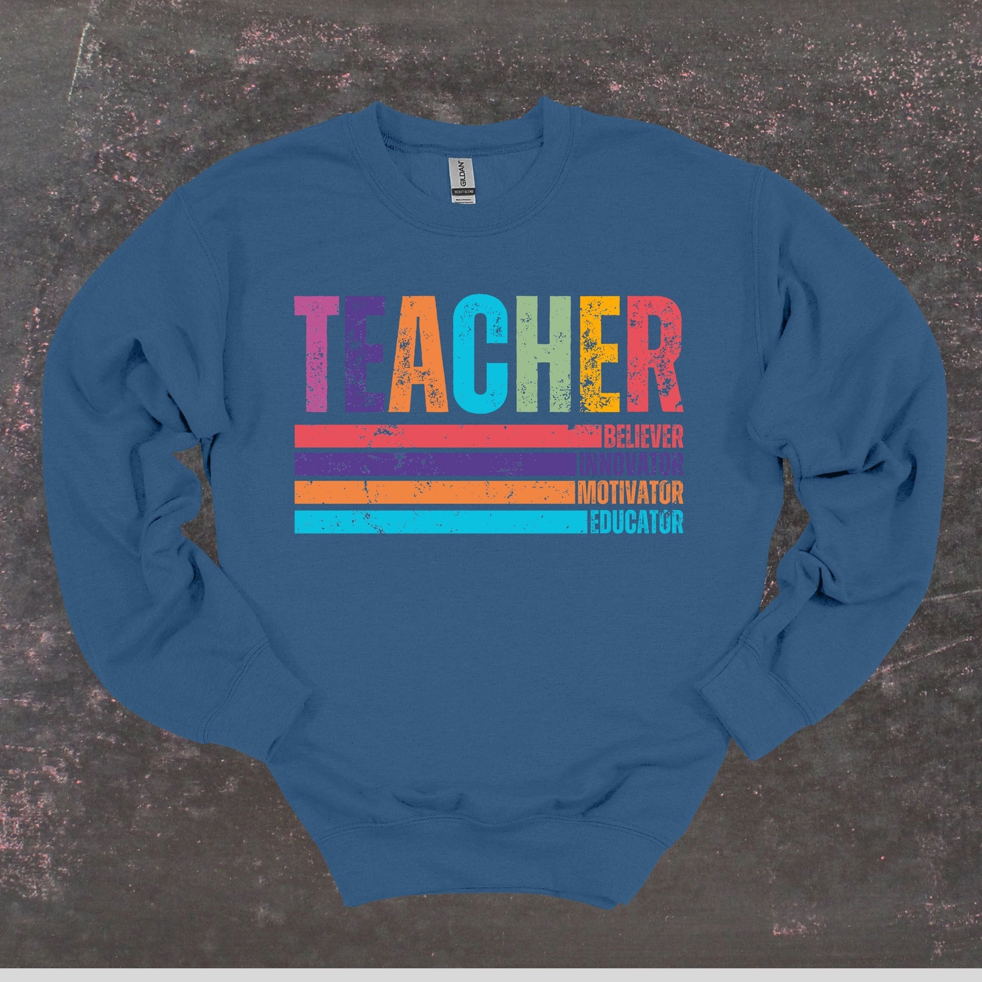 Teacher Believer Innovator Motivator Educator - Teacher Crewneck Sweatshirt - Adult Sweatshirts Crewneck Sweatshirt Graphic Avenue Indigo Blue Adult Small 